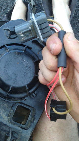 3:40pm - Holy shit! After some gentle prying, be amazed you removed the old connector from the old headlight in one piece too! ( http://oppositelock.kinja.com/headlight-saga-update-1803088685 )